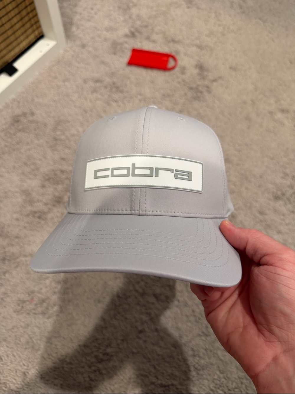 Cobra golf hat.